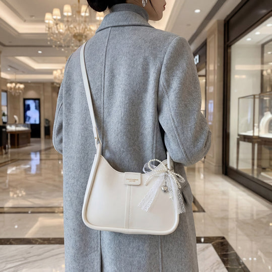 Damen Umhängetasche mit minimalistischer Form und verstellbarem Trageriemen Nord Taschen