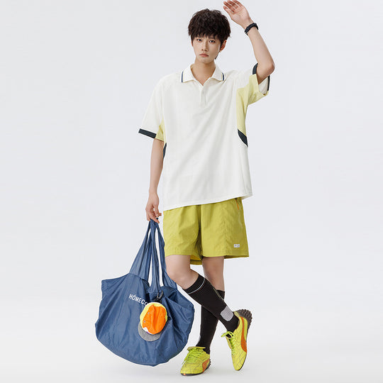Unisex Boxy Oversize Polo-Shirt aus technischem Funktionsjersey mit Kontrastpaneelen und Raglanärmeln Nord Taschen