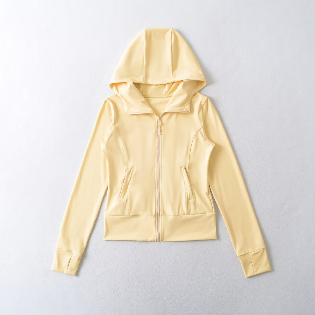 Damen Kapuzen-Sportjacke mit durchgehendem Reißverschluss, taillierter Passform und integrierten Reißverschlusstaschen Nord Taschen