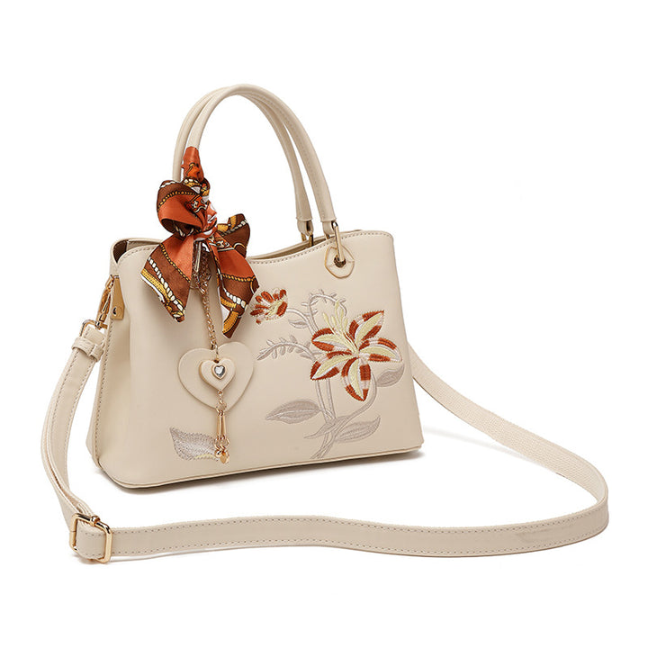 Damen elegante Handtasche mit floralem Stickdesign und modischem Schal Nord Taschen