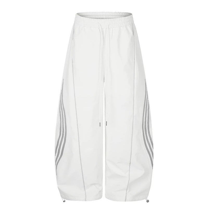 Damen Weite Tech-Material Palazzohose mit Tunnelzugbund, reflektierenden Seitenstreifen und verstellbarem Kordel-Saum Nord Taschen