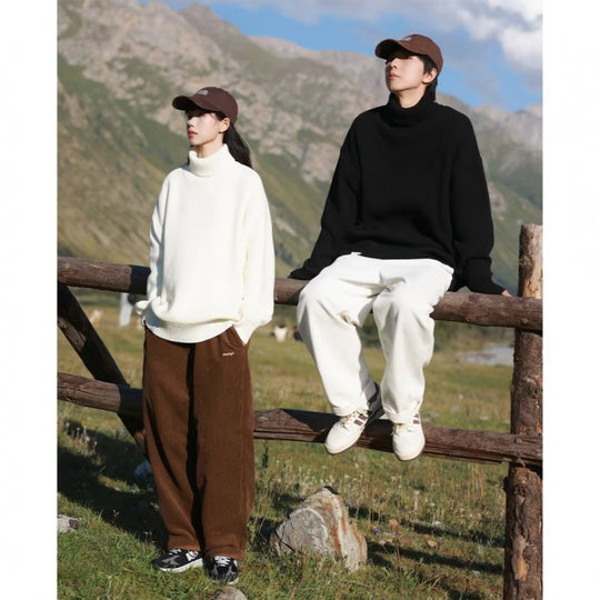 Damen Oversize-Rollkragenpullover aus weichem Baumwollmix mit gerippten Bündchen und verlängertem Saum Nord Taschen