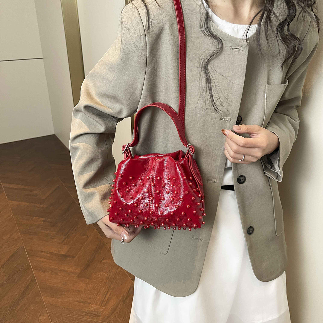 Damen Schultertasche mit strukturiertem Design und dekorativen Perlen Nord Taschen