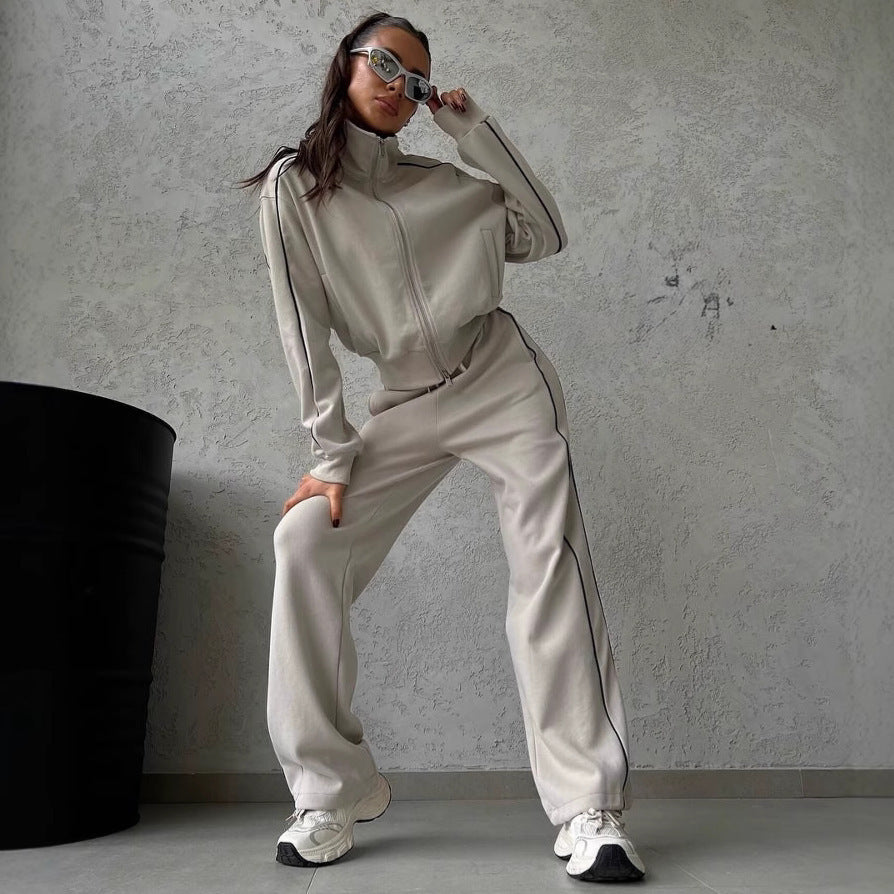 Damen lässiges Sweatset mit Stehkragen Reißverschluss gekürzter Jacke und hochtaillierter Schlaghose Nord Taschen