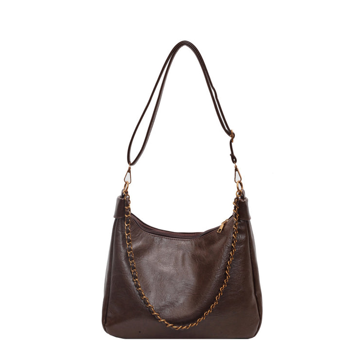 Damen stylische Umhängetasche mit goldenen Kettendetails Nord Taschen