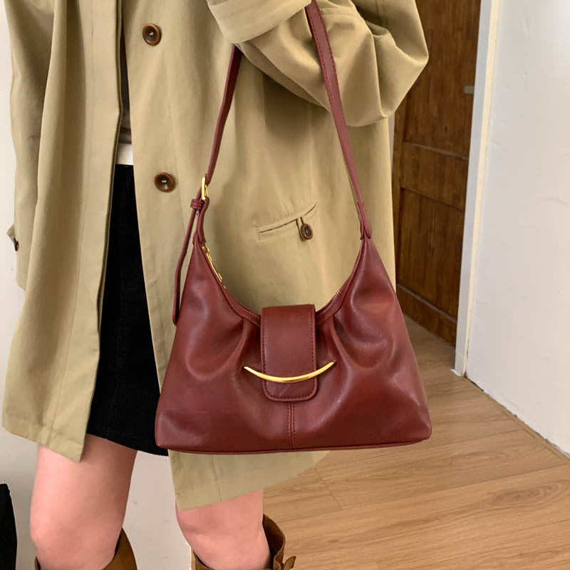 Damen Hobo-Tasche aus geschmeidigem Leder mit dekorativem Verschluss Nord Taschen