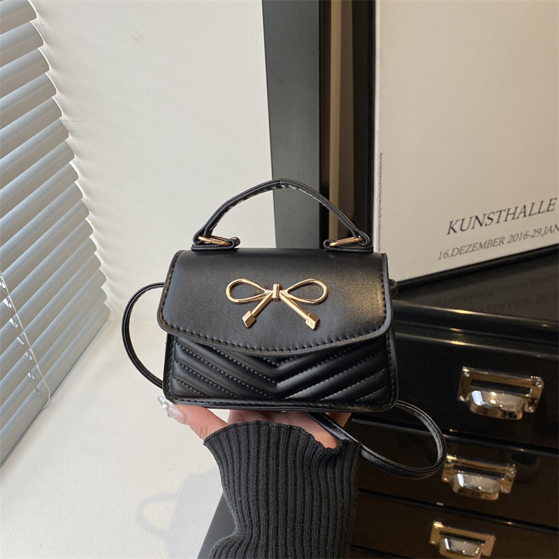 Damen Mini-Handtasche mit eleganter Schleifenverzierung Nord Taschen