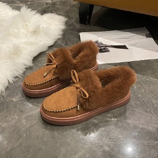 Damen Kuschel‑Mokassin‑Slipper mit hochfloriger Fellmanschette, dekorativer Steppnaht und leichtem Plateau‑Sohlenprofil Nord Taschen