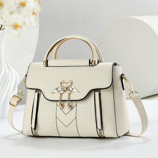 Damen elegante Handtasche mit auffälligem Schmuckdetail und verstellbarem Schultergurt Nord Taschen
