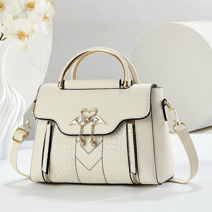 Damen elegante Handtasche mit auffälligem Schmuckdetail und verstellbarem Schultergurt Nord Taschen
