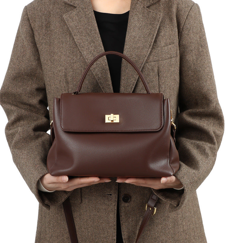 Damen Henkeltasche mit hochwertigem Kunstleder und elegantem Klappverschluss Nord Taschen