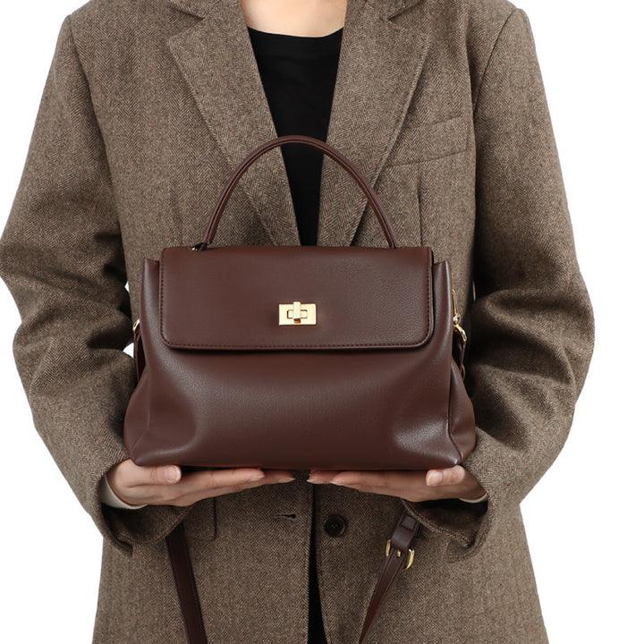 Damen Henkeltasche mit hochwertigem Kunstleder und elegantem Klappverschluss Nord Taschen