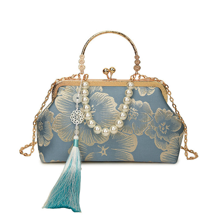 Damen elegante Abendtasche mit floralem Design und attraktiver Kettenakzent Nord Taschen