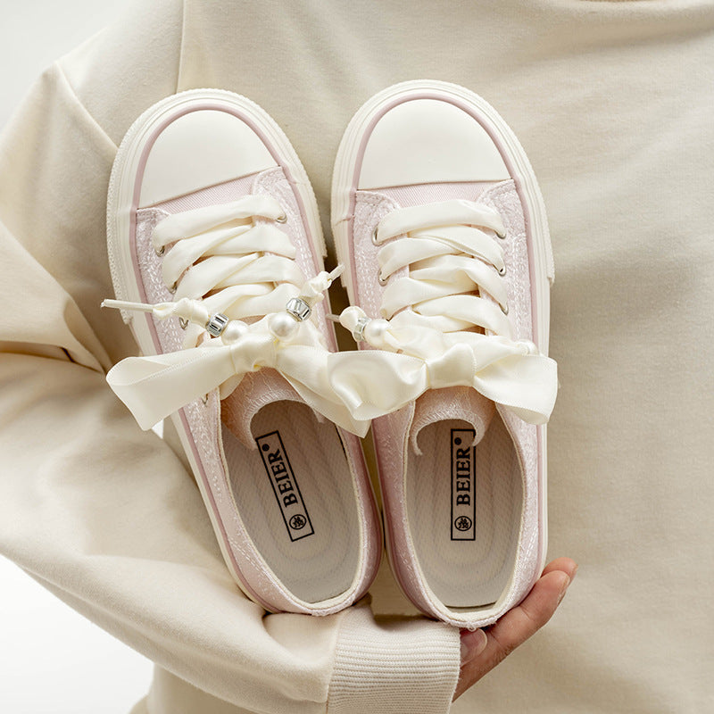 Damen Bequeme Plattform-Sneaker mit verspielten Schnürsenkeln und eleganter Oberfläche