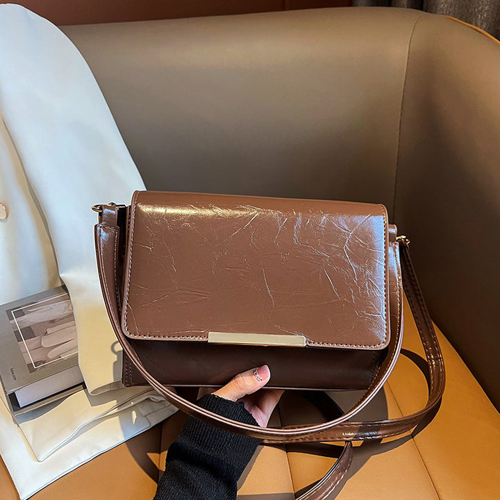 Damen modische Crossbody-Tasche mit edlem Klappdeckel Nord Taschen