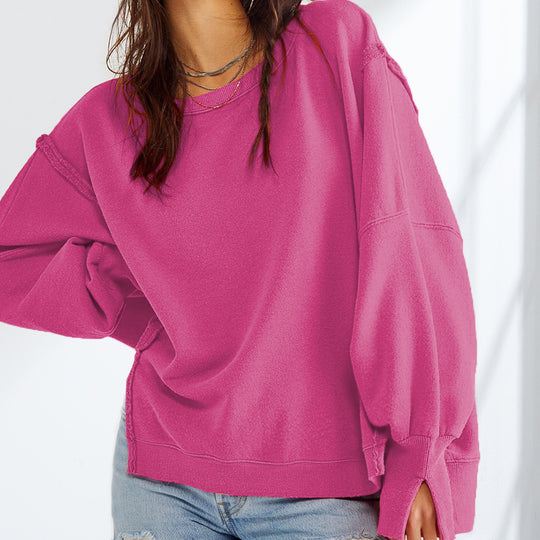 Damen Oversized Sweatshirt mit Ballonärmeln, seitlichen Schlitzen und offenen Kanten Nord Taschen