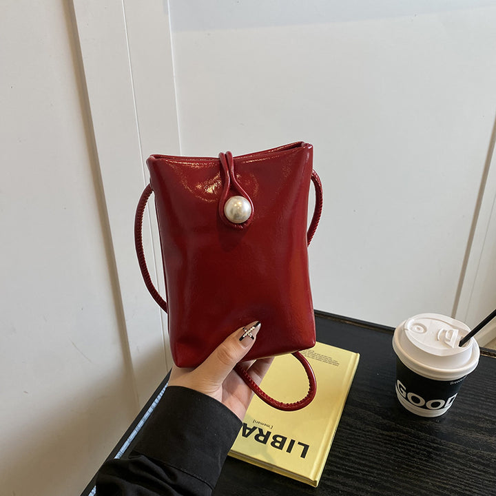 Damen elegante Clutch mit Perlenakzent Nord Taschen