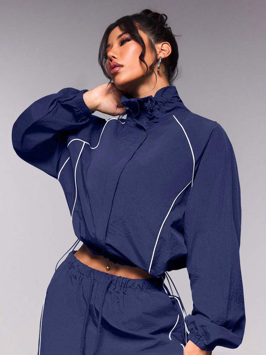 Damen sportives Cropped Windbreaker-Set mit Stehkragen Tunnelzug und reflektierenden Paspeln Nord Taschen