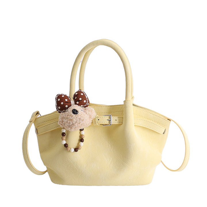Damen elegante Handtasche mit verspieltem Tieranhänger Nord Taschen