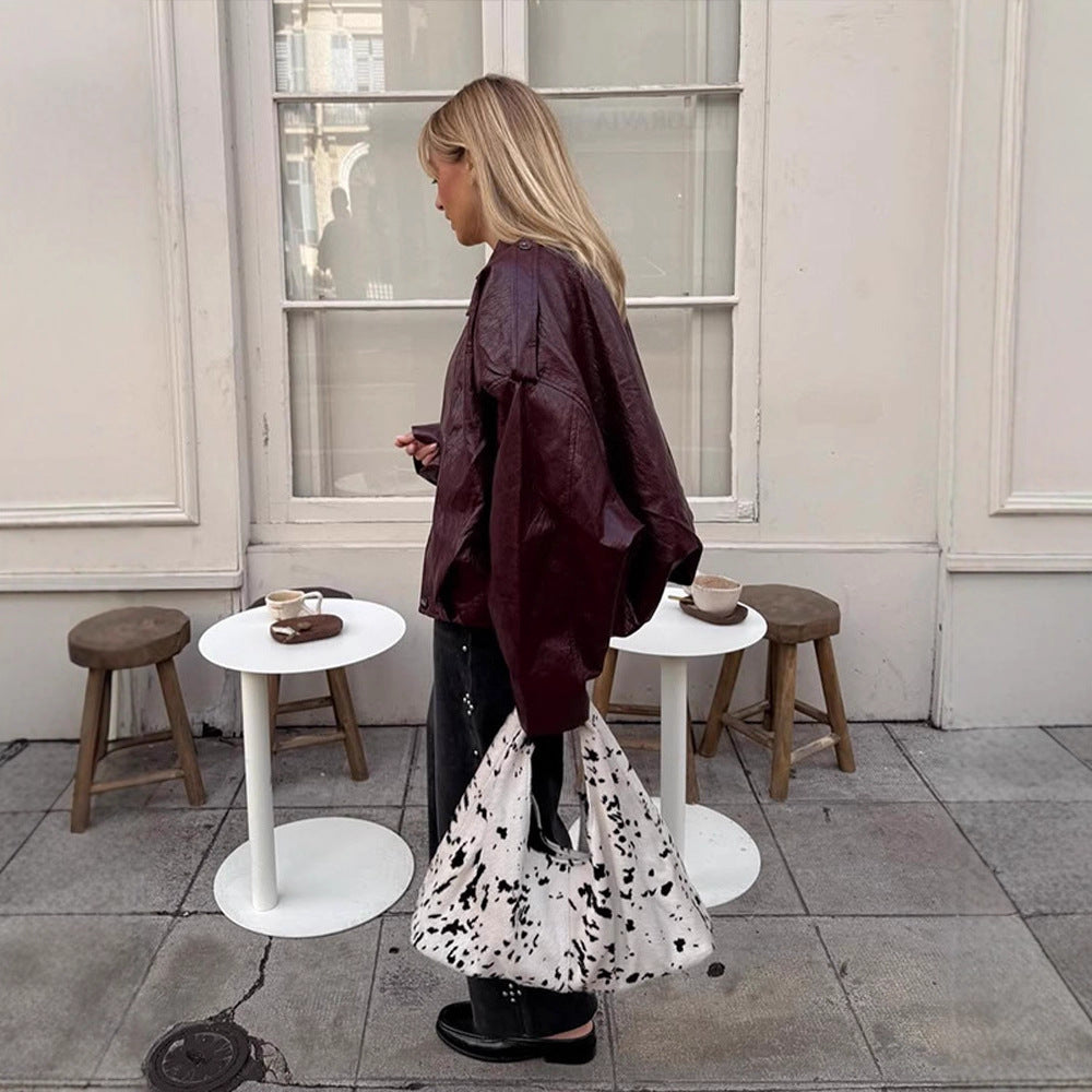 Damen Kurzblouson in glänzender Lackoptik mit Boxy‑Silhouette und überschnittenen Schultern Nord Taschen