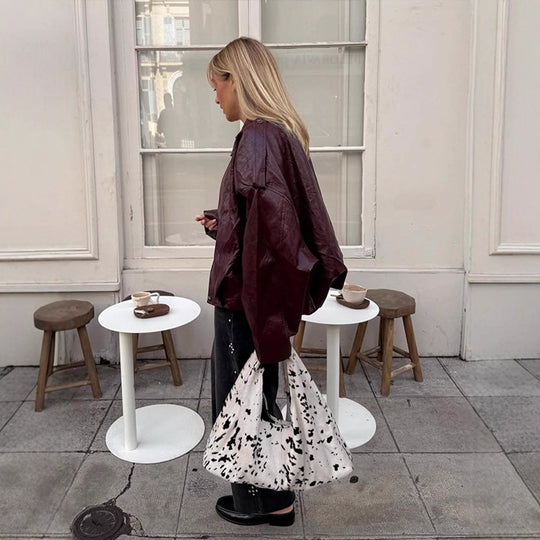 Damen Kurzblouson in glänzender Lackoptik mit Boxy‑Silhouette und überschnittenen Schultern Nord Taschen
