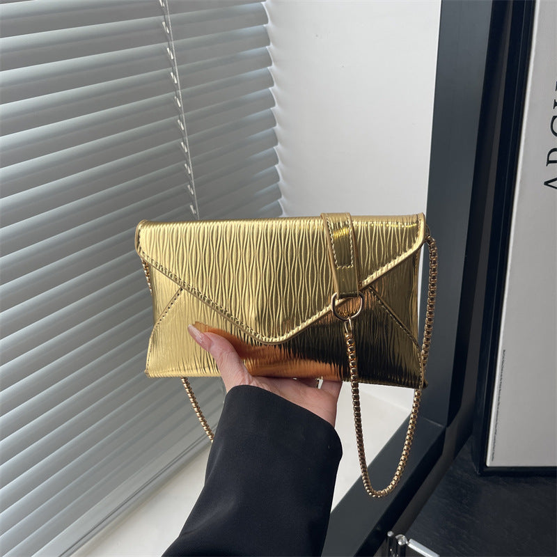 Damen elegante Clutch mit schimmerndem Wellenmuster Nord Taschen