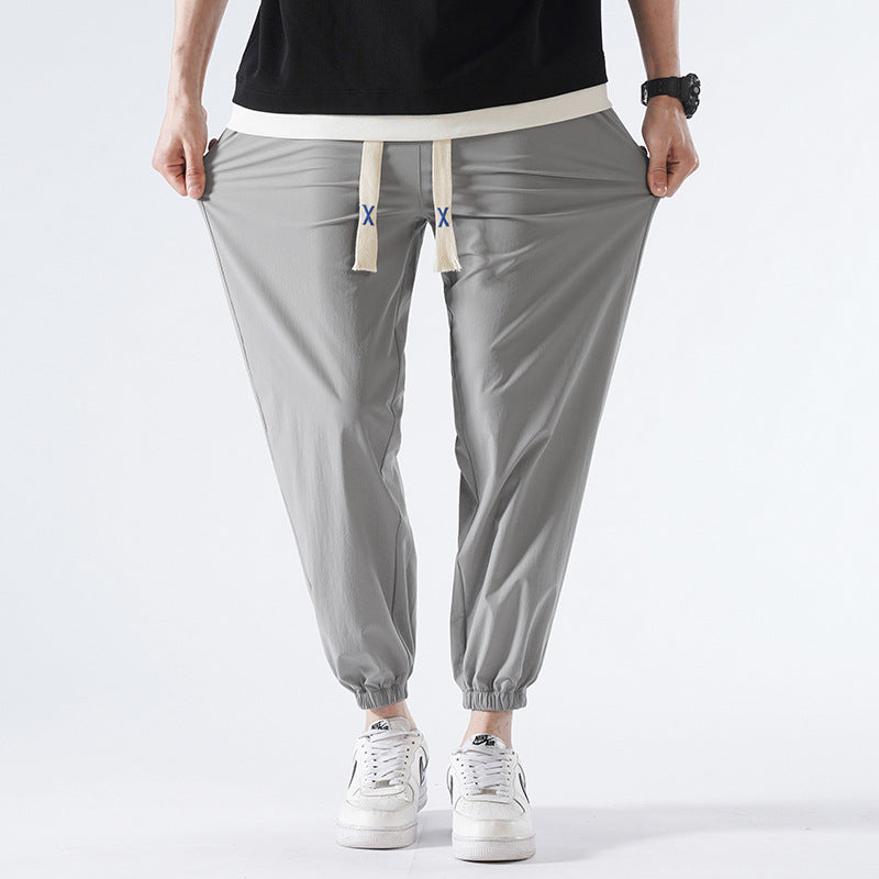 Herren Leichte Relax-Fit-Loungehose aus atmungsaktivem Jersey mit elastischem Tunnelbund, breitem Kordelzug & geripptem Beinabschluss Nord Taschen