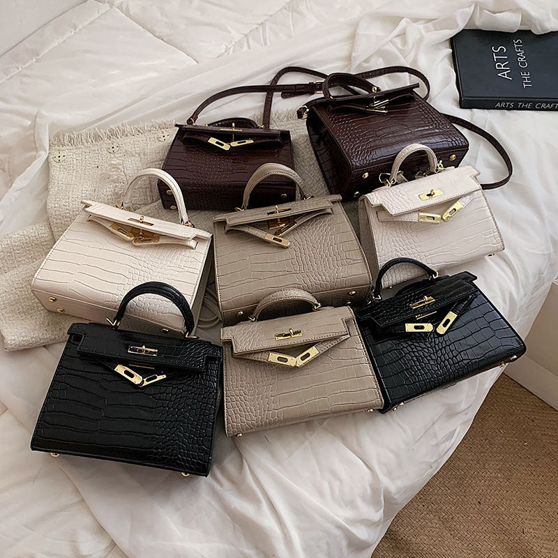 Damen Handtasche im luxuriösen Krokodil-Look mit goldenen Details | Nord Taschen