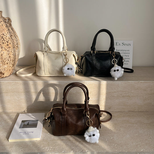 Damen elegante Umhängetasche mit modischem Anhänger Nord Taschen