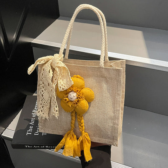 Damen Handtasche mit floralen Details und romantischem Bogen Nord Taschen