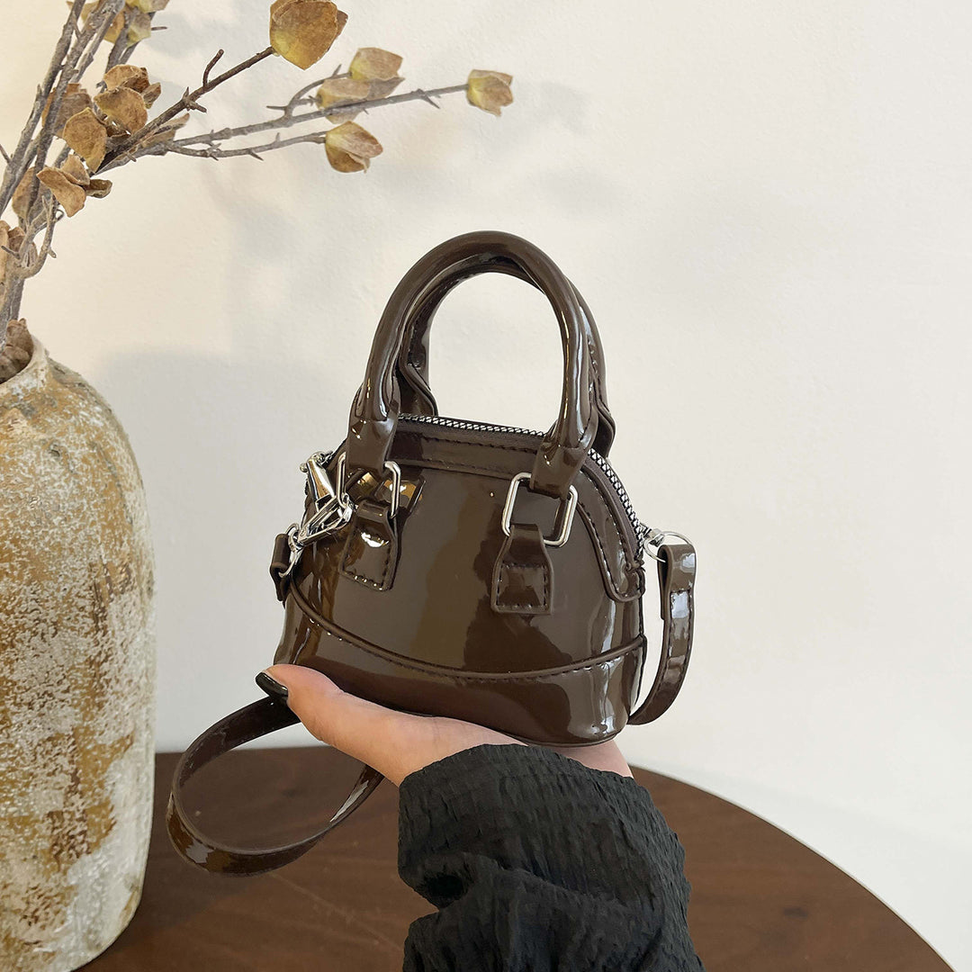 Damen Mini-Handtasche mit glänzender Oberfläche und modischem Reißverschluss Nord Taschen