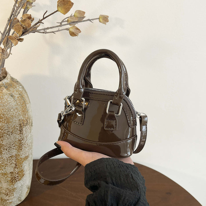 Damen Mini-Handtasche mit glänzender Oberfläche und modischem Reißverschluss Nord Taschen