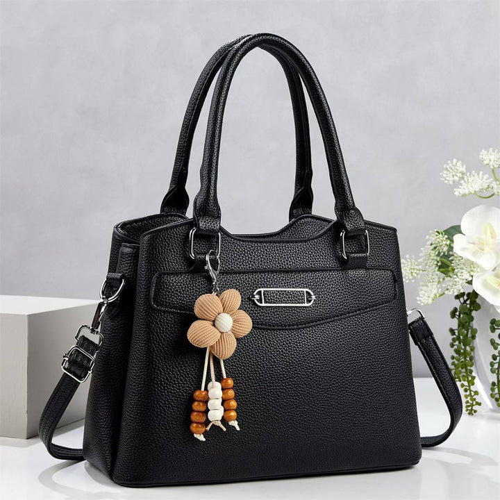 Damen elegante Handtasche mit abnehmbarem Blumen-Anhänger Nord Taschen