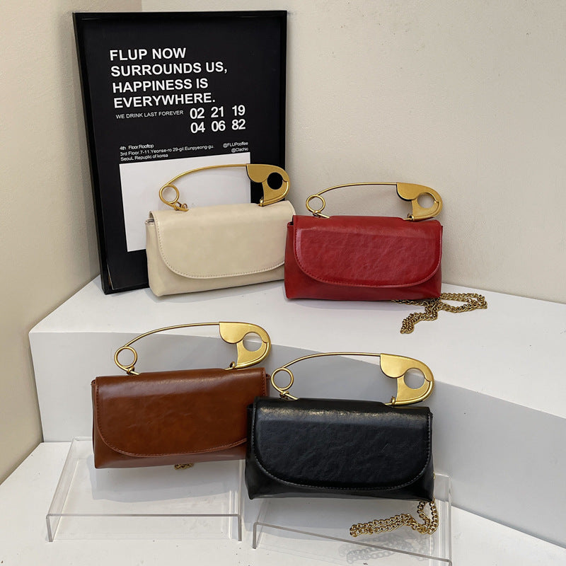 Damen elegante Handtasche mit künstlerischem Metallgriff Nord Taschen