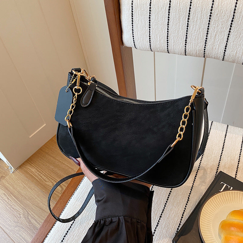 Damen elegante Umhängetasche mit feinem Kettenakzent Nord Taschen
