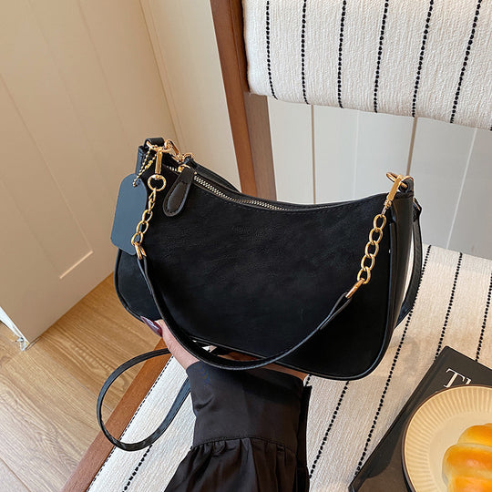 Damen elegante Umhängetasche mit feinem Kettenakzent Nord Taschen