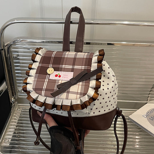 Damen Rucksack mit kreativem Karomuster und verspielten Details Nord Taschen