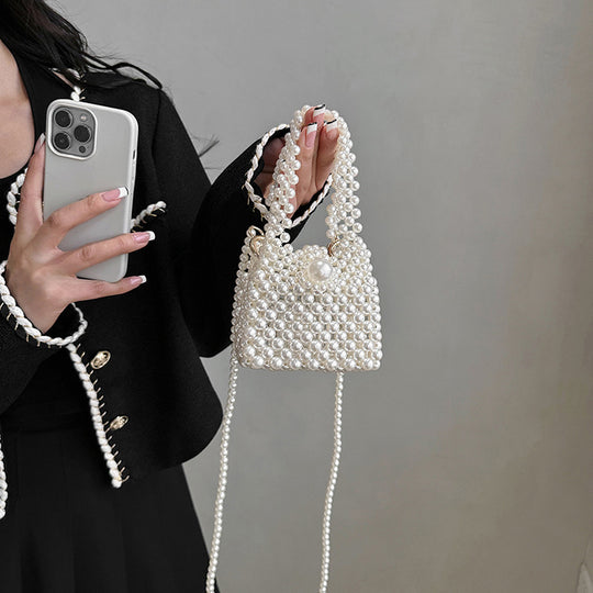 Damen Clutch-Tasche mit perlensynthetischer Oberfläche und dekorativem Verschluss Nord Taschen