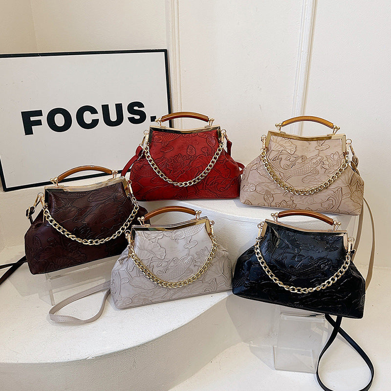 Damen elegante Handtasche mit floralem Präge-Design Nord Taschen