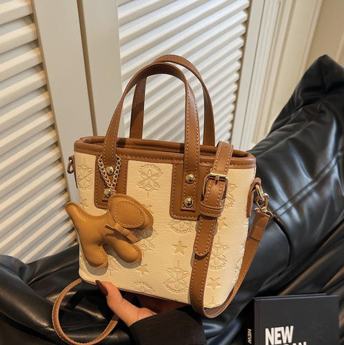 Damen Mini-Handtasche mit verspieltem Anhänger | Nord Taschen