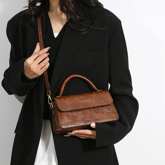 Damen elegante Umhängetasche mit abnehmbaren Schulterriemen und strukturiertem Design Nord Taschen