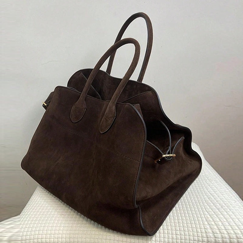 Damen Tasche mit weichem Veloursleder und verstellbarem Schultergurt Nord Taschen