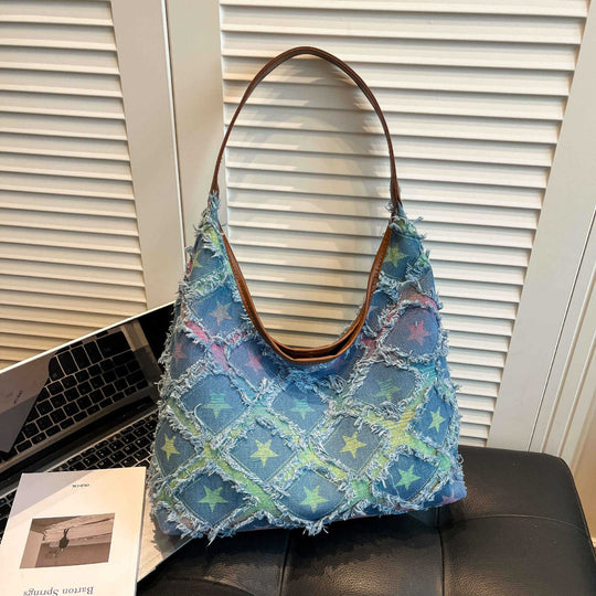 Damen Hobo-Tasche mit buntem Sternenmuster und fransigen Akzenten Nord Taschen