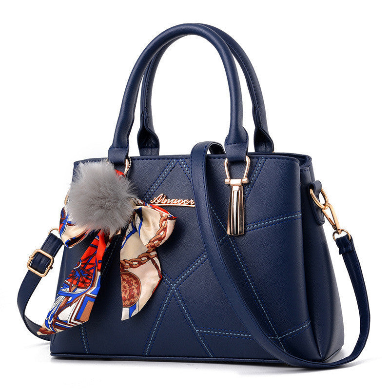 Damen Handtasche mit elegantem geometrischem Design und verspieltem Schal Nord Taschen