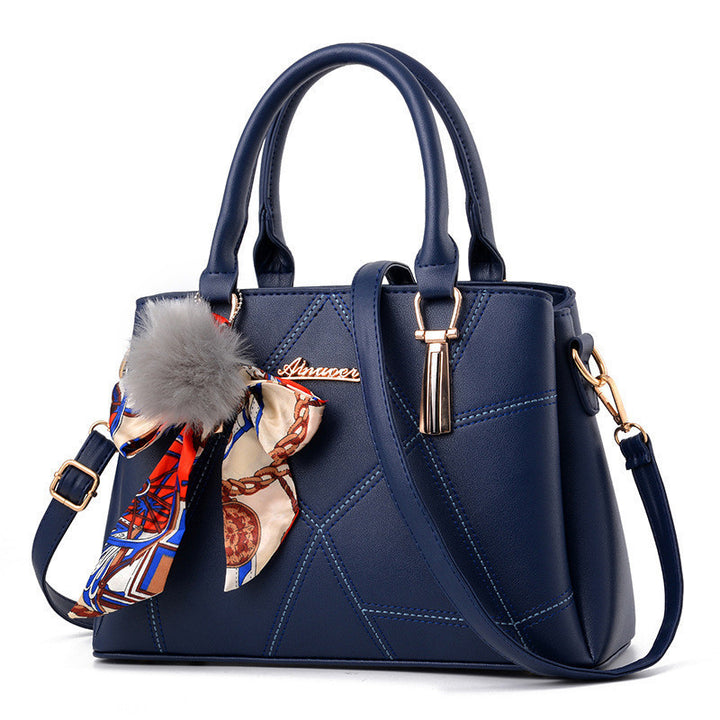 Damen Handtasche mit elegantem geometrischem Design und verspieltem Schal Nord Taschen
