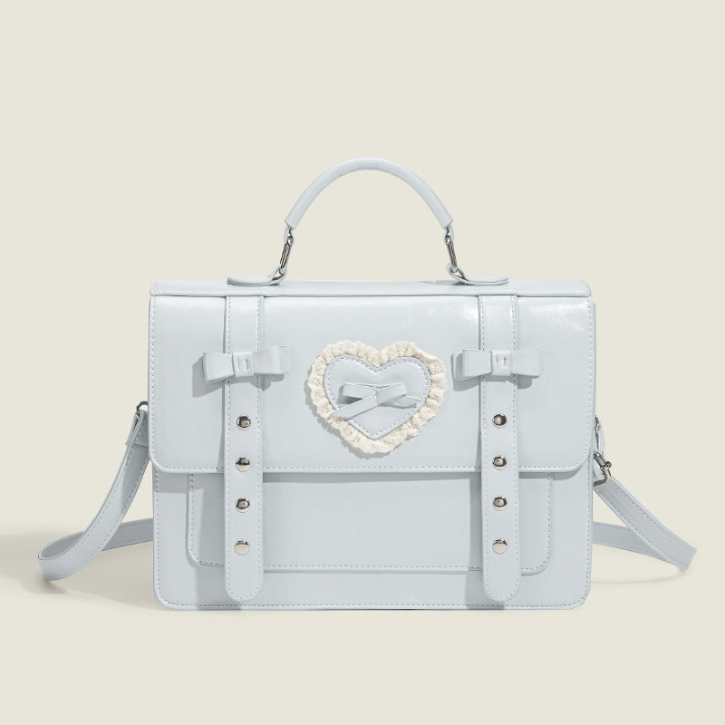 Damen Handtasche mit romantischem Herzdesign und verspielten Schleifen Nord Taschen