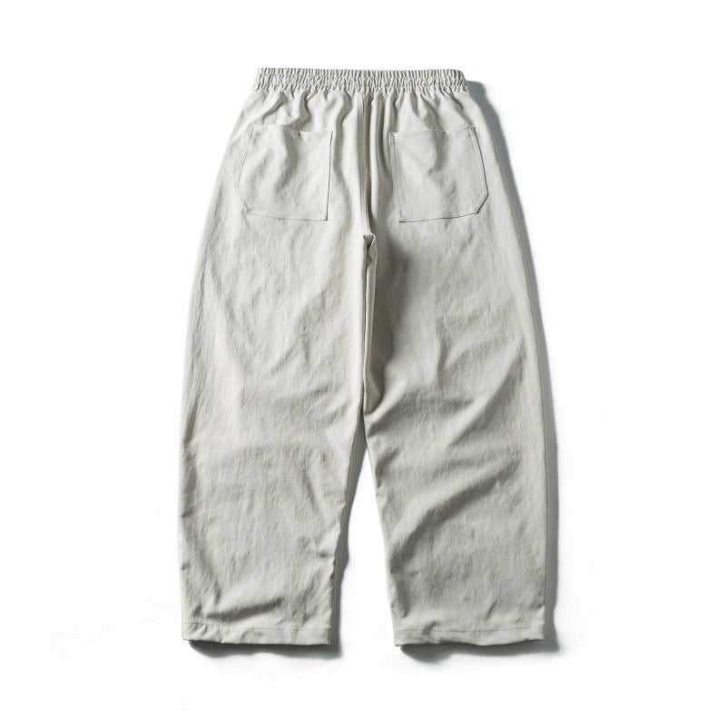 Unisex Weite Cropped-Hose mit Tunnelzug, elastischem Bund und markanten Nahtpaneelen Nord Taschen