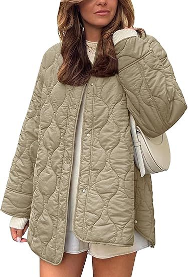 Damen Steppjacke im Oversize Design mit gewölbter Steppung und seitlichem Schlitz Nord Taschen