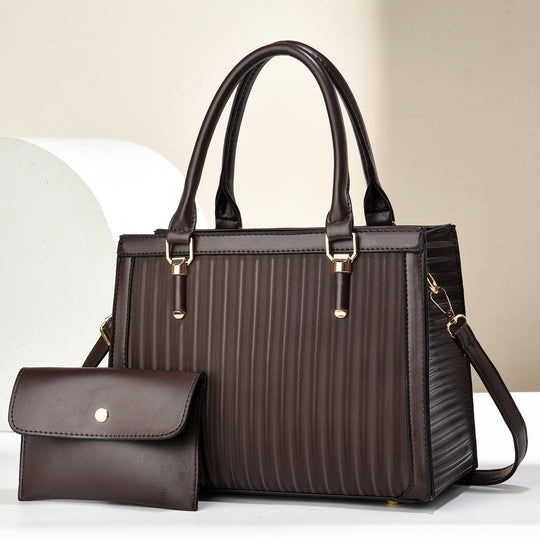 Damen elegante Handtasche mit Streifenstruktur und abnehmbarer Clutch Nord Taschen