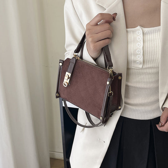 Damen elegante Handtasche mit glänzenden Akzenten und praktischem Reißverschluss Nord Taschen